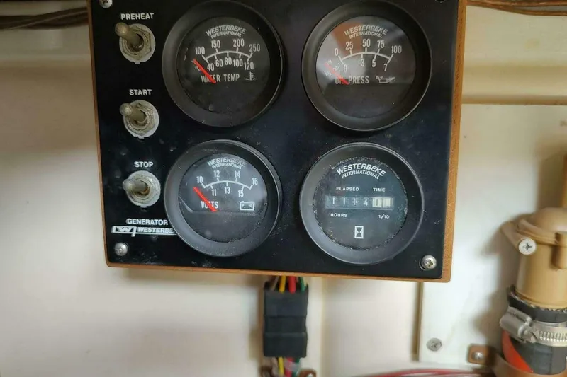 Slide: The Image of Westerbeke generator control panel on 1996 Grand Banks Eastbay 40 Flybridge boat. - 93