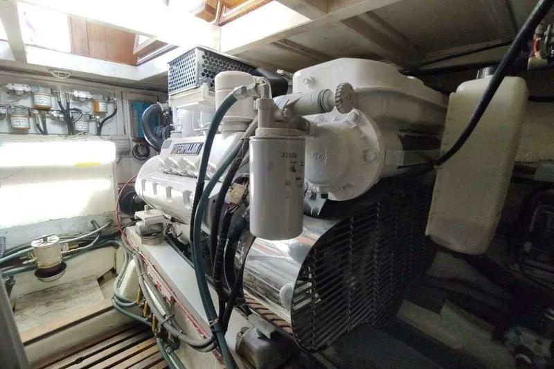 Slide: The Image of Engine room of 1996 Grand Banks Eastbay 40 Flybridge with Caterpillar engine. - 85