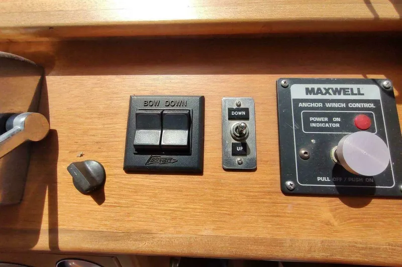 Slide: The Image of Control panel of a 1996 Grand Banks Eastbay 40 Flybridge with anchor winch controls. - 35