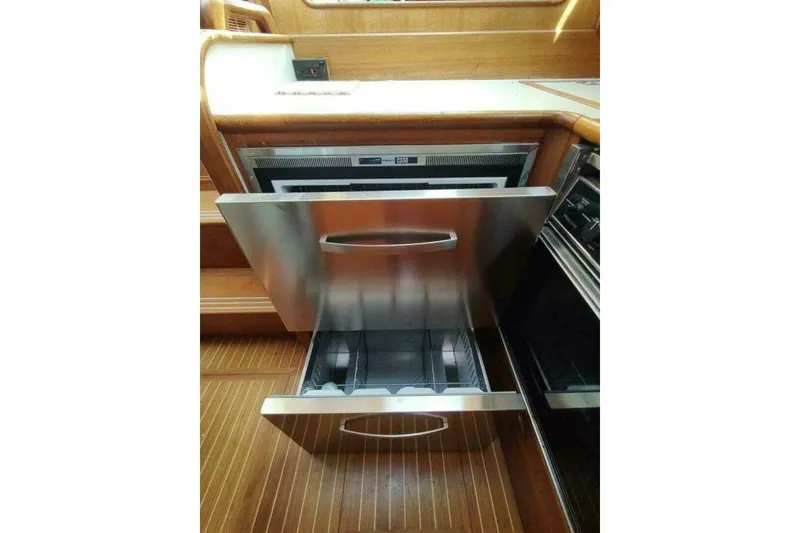 Slide: The Image of Stainless steel drawer in 1996 Grand Banks Eastbay 40 Flybridge yacht kitchen. - 53