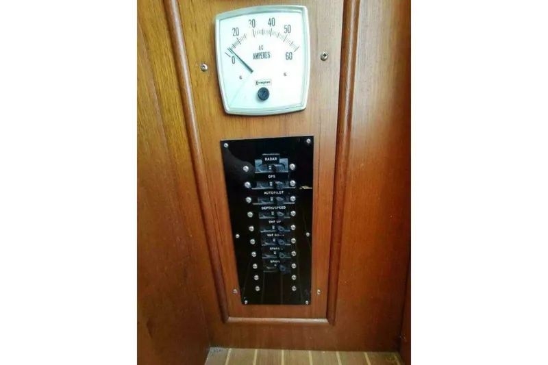 Slide: The Image of Electrical panel and amp meter on 1996 Grand Banks Eastbay 40 Flybridge yacht. - 36