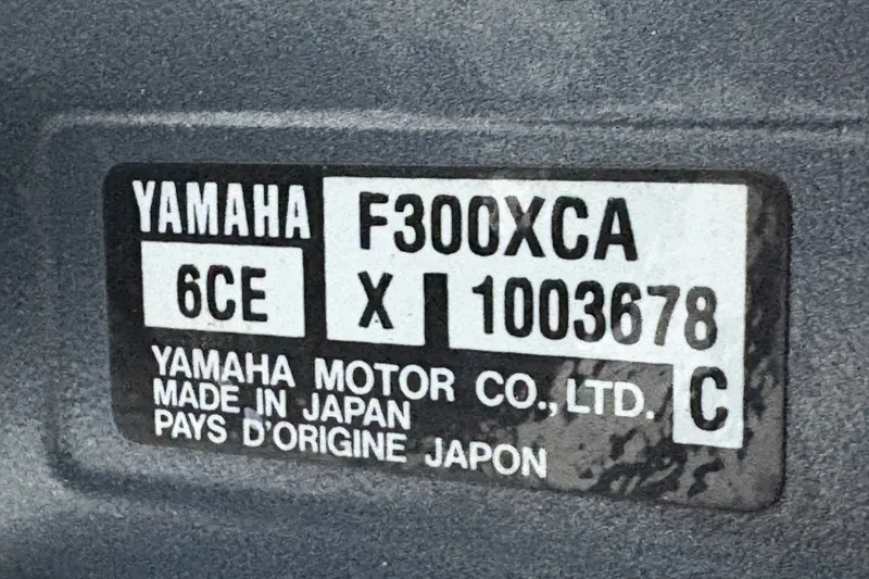 Slide: The Image of Yamaha F300XCA engine label on 2004 Grady White Bimini 306, made in Japan. - 26