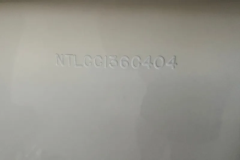 Slide: The Image of Hull identification number on 2004 Grady White Bimini 306 boat. - 27
