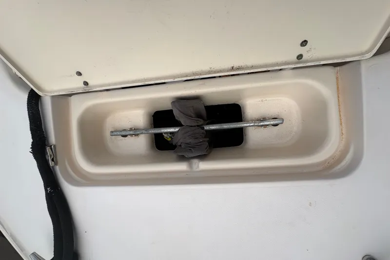 Slide: The Image of Storage compartment on a 2004 Grady White Bimini 306 boat. - 13