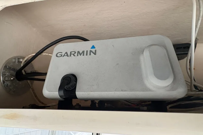 Slide: The Image of Garmin device installed on a 2004 Grady White Bimini 306 boat. - 19