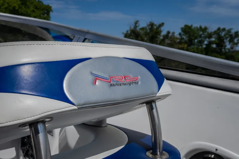 Slide: The Image of Close-up of Nautical NRG 30 boat seat, featuring blue and white design, 2012 model. - 38