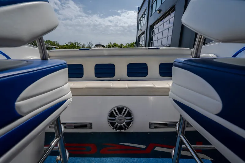 Slide: The Image of Interior of 2012 Nautical NRG 30 boat with blue and white seating. - 36