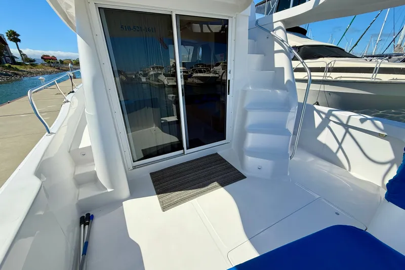 Slide: The Image of Flybridge steps and sliding door to main salon - 18