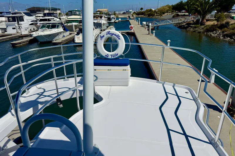 Slide: The Image of Nice aft deck on flybridge is great for addl. seating or watching events! - 15