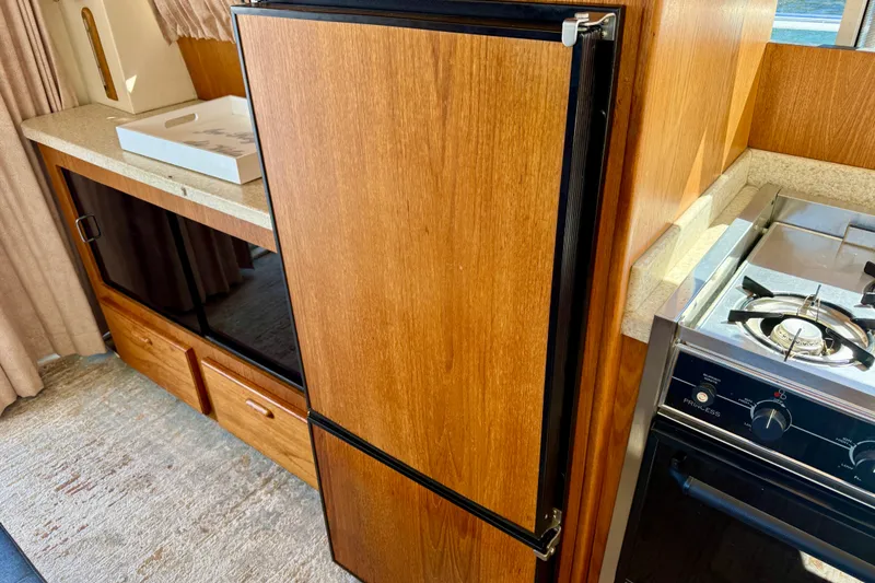 Slide: The Image of Refrigerator with freezer below - 31