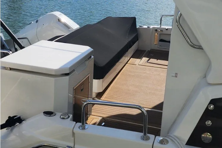 Slide: The Image of 2024 Aquila 36 Sport yacht deck with sleek design and modern amenities. - 25