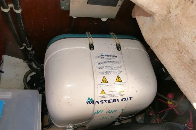 Slide: The Image of Mastervolt battery system in a 1999 Beneteau 411 yacht engine compartment. - 71