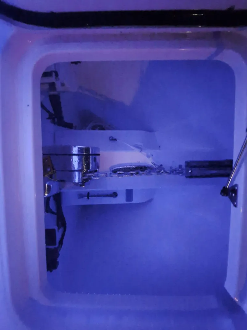 Slide: The Image of 2024 Southport 30 FE boat interior with blue LED lighting. - 34