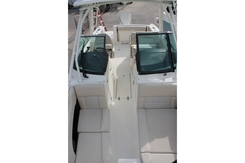 Slide: The Image of 2020 Boston Whaler 230 Vantage boat interior with seating and windshield. - 8