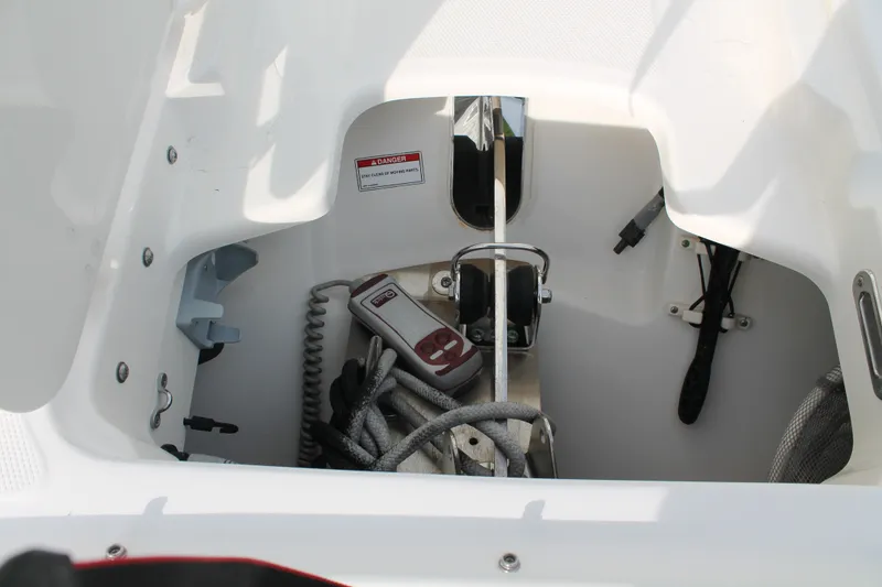 Slide: The Image of Storage compartment of a 2020 Boston Whaler 230 Vantage boat with equipment. - 7