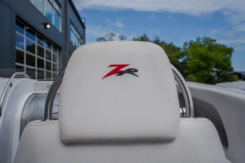Slide: The Image of 2005 Donzi 35 ZR boat seat with logo, outdoor setting. - 41