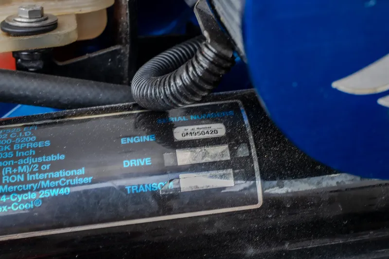 Slide: The Image of Close-up of a 2005 Donzi 35 ZR engine serial number plate. - 48