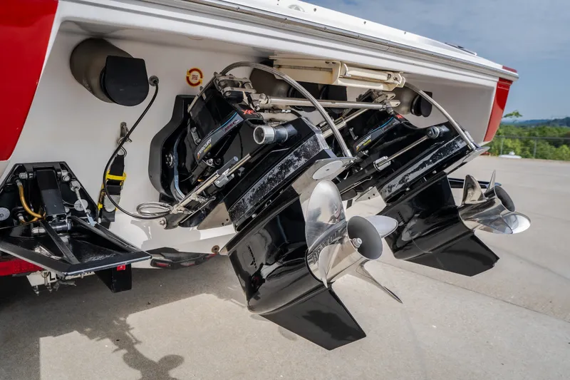 Slide: The Image of 2005 Donzi 35 ZR boat with dual Mercury outboard engines and stainless steel propellers. - 15