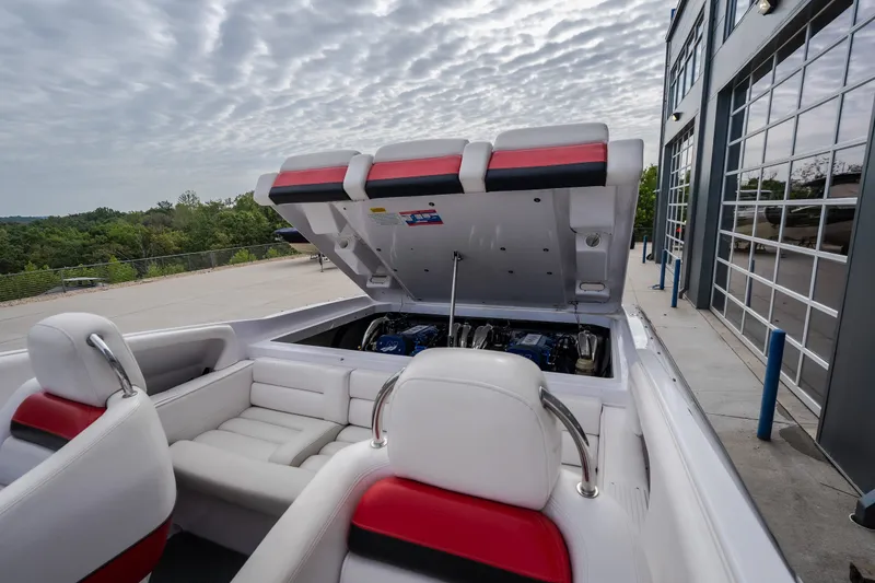 Slide: The Image of 2005 Donzi 35 ZR boat with open engine compartment, showcasing sleek interior design. - 32