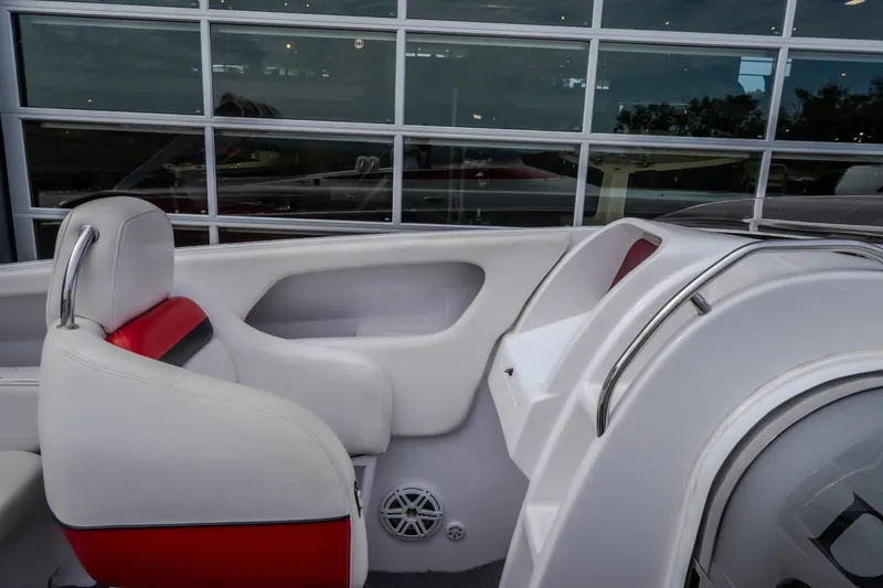 Slide: The Image of Interior of a 2005 Donzi 35 ZR boat with white and red seating. - 29