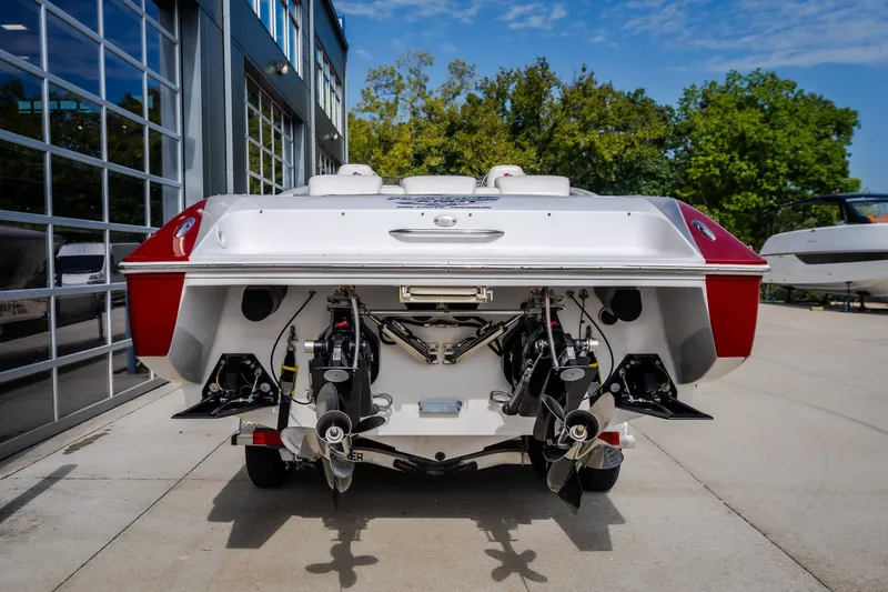 Slide: The Image of Rear view of a 2005 Donzi 35 ZR boat with dual propellers. - 12