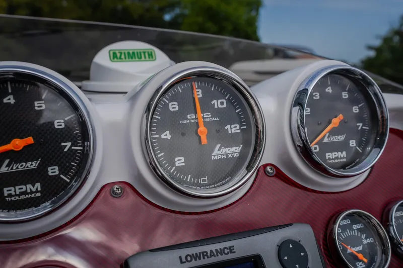 Slide: The Image of Dashboard of a 2005 Donzi 35 ZR boat with Livorsi gauges and Lowrance display. - 27