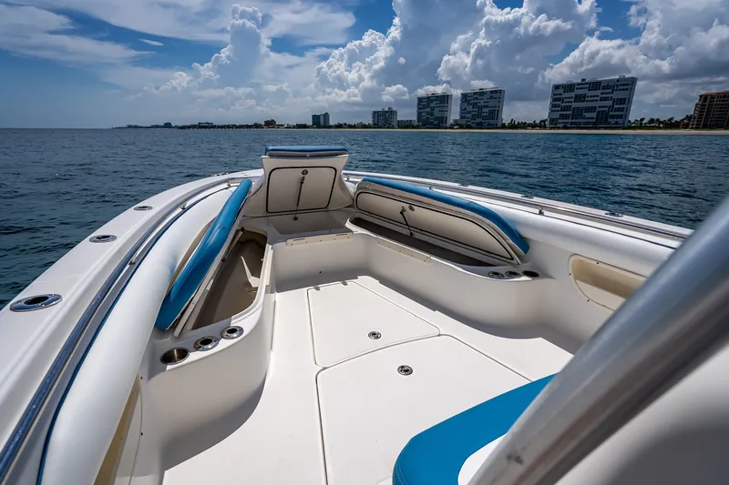 Slide: The Image of 2006 Boston Whaler 320 Outrage boat interior with ocean and skyline view. - 30