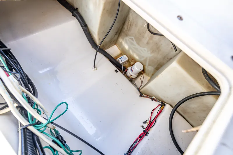Slide: The Image of 2006 Boston Whaler 320 Outrage interior wiring and components view. - 66