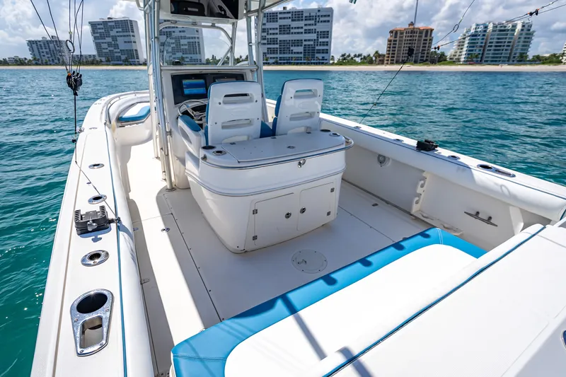 Slide: The Image of 2006 Boston Whaler 320 Outrage boat interior with ocean view and modern amenities. - 57