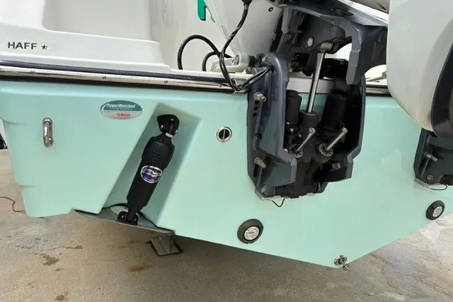 Slide: The Image of 2021 Century 24 Resorter boat stern with Yamaha outboard motor and Power-Pole anchor system. - 26