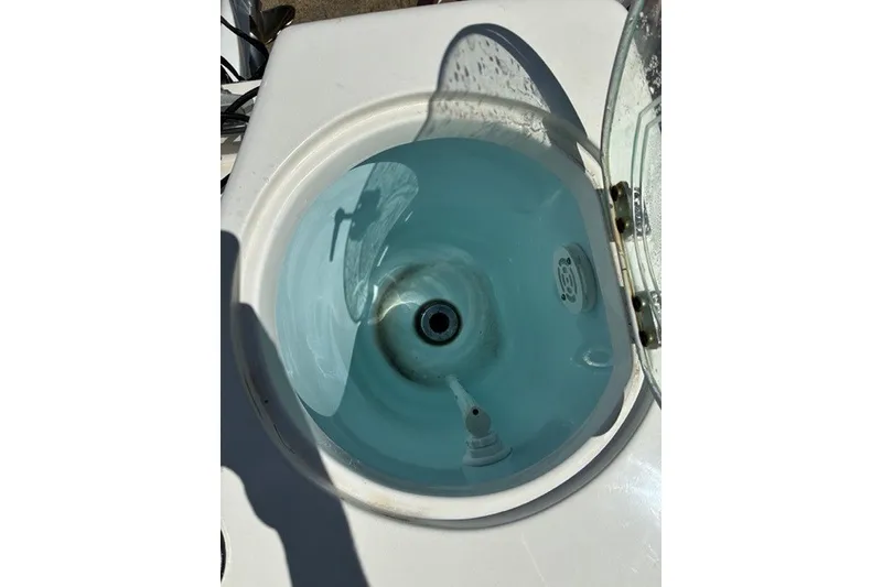 Slide: The Image of Livewell on 2021 Century 24 Resorter boat, filled with water. - 50