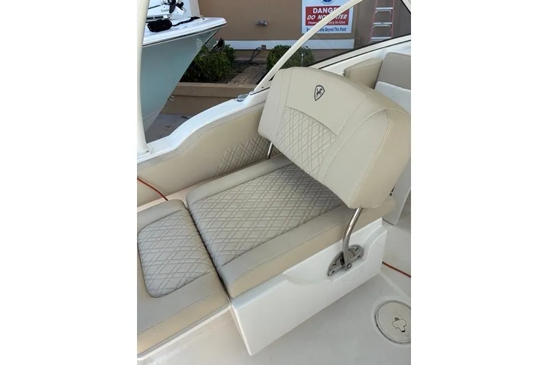 Slide: The Image of Luxurious seating on a 2021 Century 24 Resorter boat with diamond-stitched upholstery. - 46