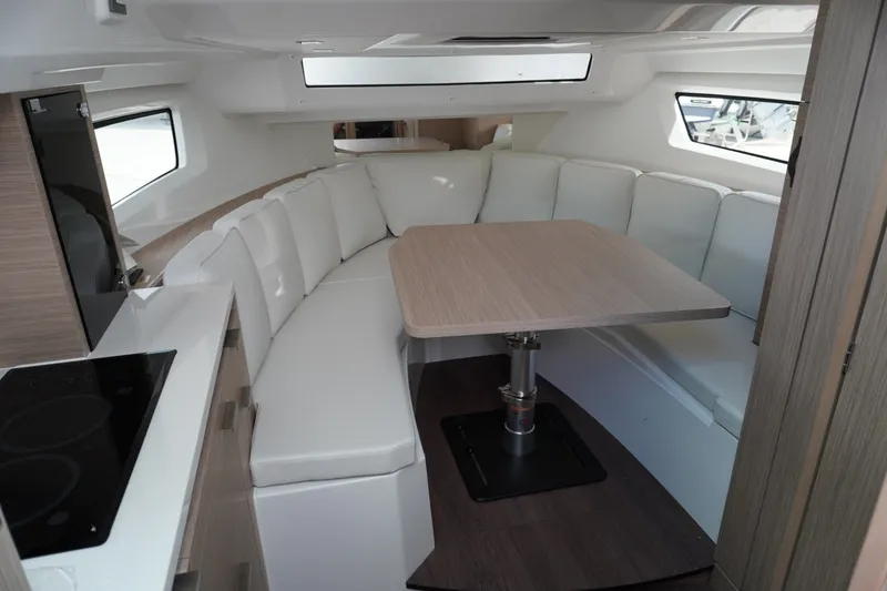 Slide: The Image of Interior of 2027 Jeanneau Leader 10.5 WA Series 2 with modern seating and dining area. - 30