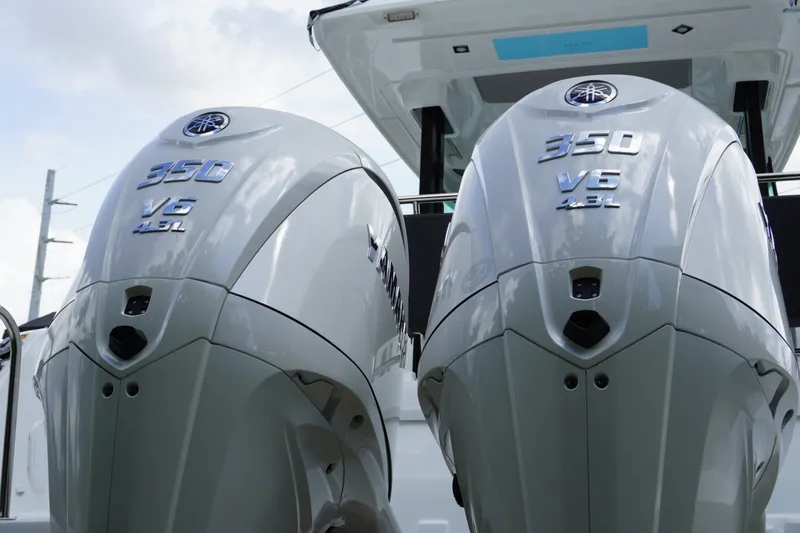 Slide: The Image of Twin Yamaha 350 V6 outboard engines on a 2027 Jeanneau Leader 10.5 WA Series 2 boat. - 2