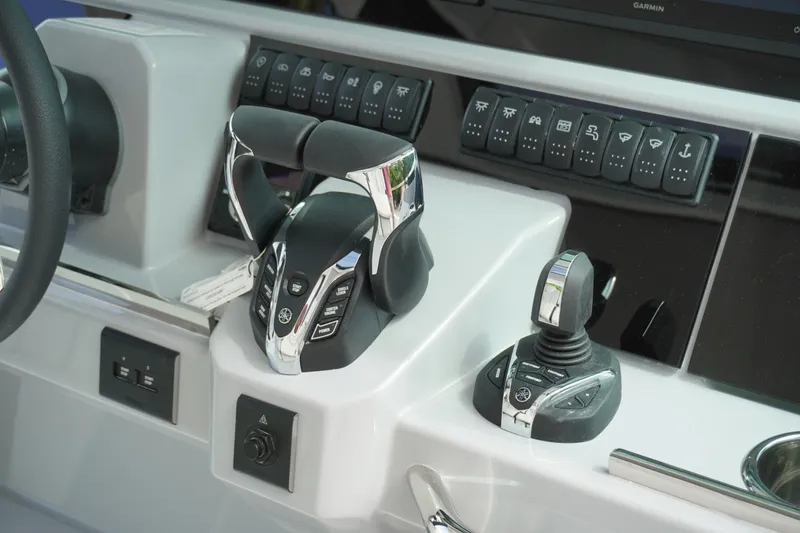 Slide: The Image of Control panel of 2027 Jeanneau Leader 10.5 WA Series 2 boat, featuring advanced navigation controls. - 21