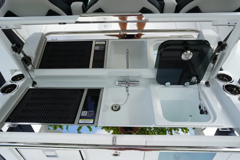 Slide: The Image of Modern kitchen setup on Jeanneau Leader 10.5 WA Series 2 boat, 2027 model. - 16