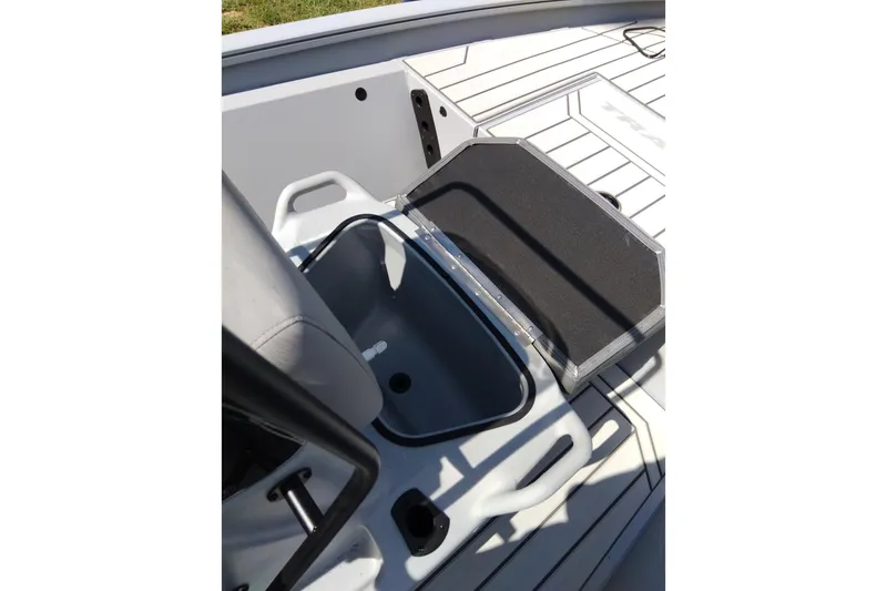 Slide: The Image of 2027 Tracker Bass Tracker 175 CC boat interior with storage compartment open. - 14