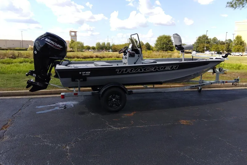 Slide: The Image of 2027 Tracker Bass Tracker 175 CC boat on trailer, parked outdoors. - 50