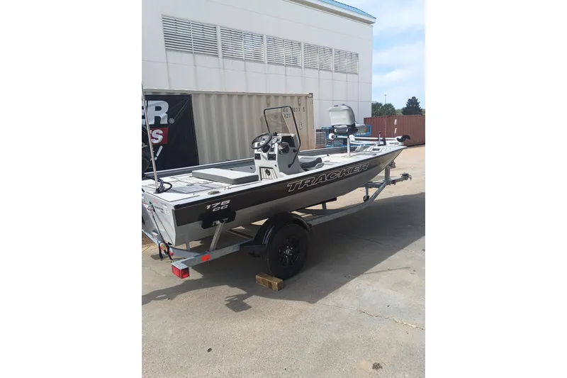 The Image of 2027 Tracker Bass Tracker 175 CC boat on trailer, parked outdoors. - 0