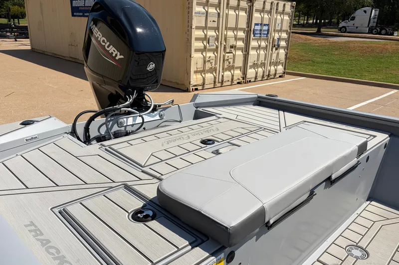 Slide: The Image of 2027 Tracker Bass Tracker 175 CC boat with Mercury engine, featuring sleek deck design. - 13