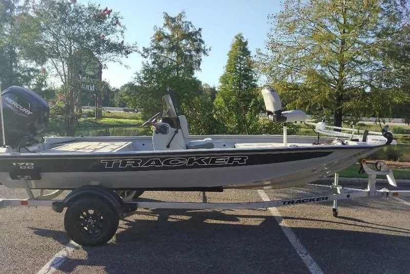 The Image of 2027 Tracker Bass Tracker 175 CC boat on trailer, parked outdoors. - 0