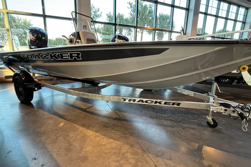 The Image of 2027 Tracker Bass Tracker 175 CC boat on display in a showroom. - 0