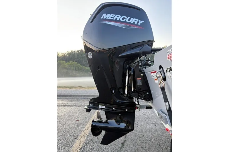 Slide: The Image of 2027 Tracker Bass Tracker 175 CC with Mercury outboard motor on a trailer. - 13