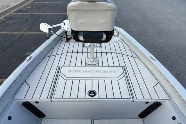 Slide: The Image of 2027 Tracker Bass Tracker 175 CC boat deck with seating and storage compartments. - 36