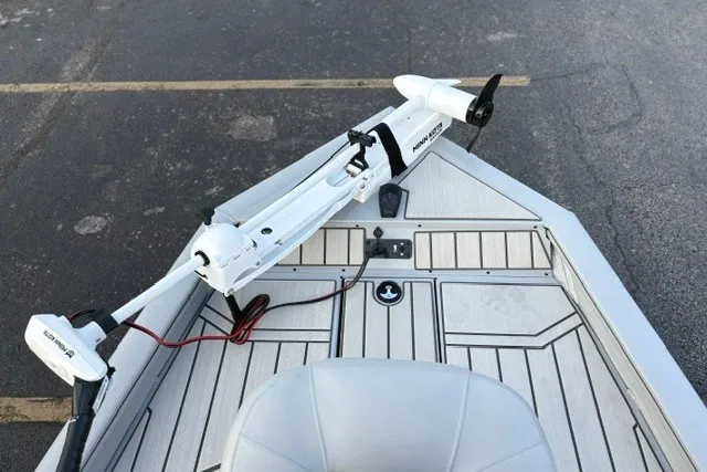 Slide: The Image of 2027 Tracker Bass Tracker 175 CC boat deck with trolling motor. - 16