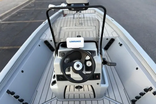 Slide: The Image of 2027 Tracker Bass Tracker 175 CC boat interior with steering wheel and Lowrance navigation system. - 17