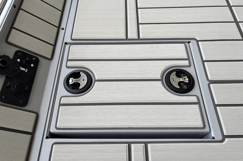 Slide: The Image of Deck of 2027 Tracker Bass Tracker 175 CC boat with storage compartment. - 24