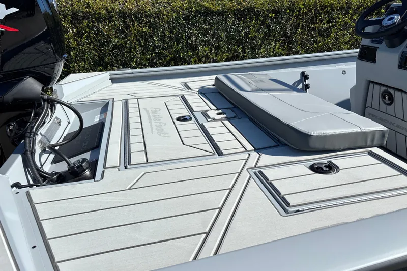 Slide: The Image of 2027 Tracker Bass Tracker 175 CC boat interior with sleek seating and storage compartments. - 13