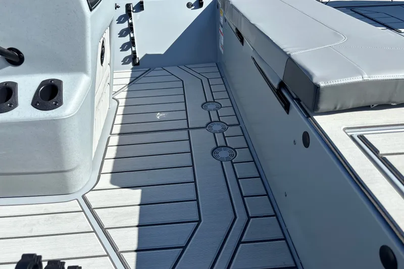 Slide: The Image of 2027 Tracker Bass Tracker 175 CC boat interior with sleek seating and modern design. - 16