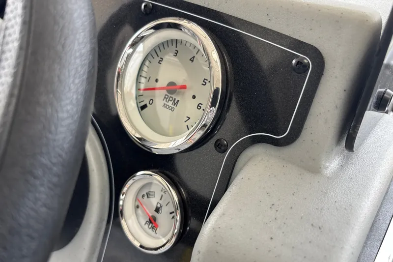 Slide: The Image of Dashboard of 2027 Tracker Bass Tracker 175 CC showing RPM and fuel gauges. - 20